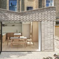 The DHaus Company revamps London house with butterfly-roof extension